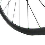 custom handbuilt gravel bike wheel, green nipples